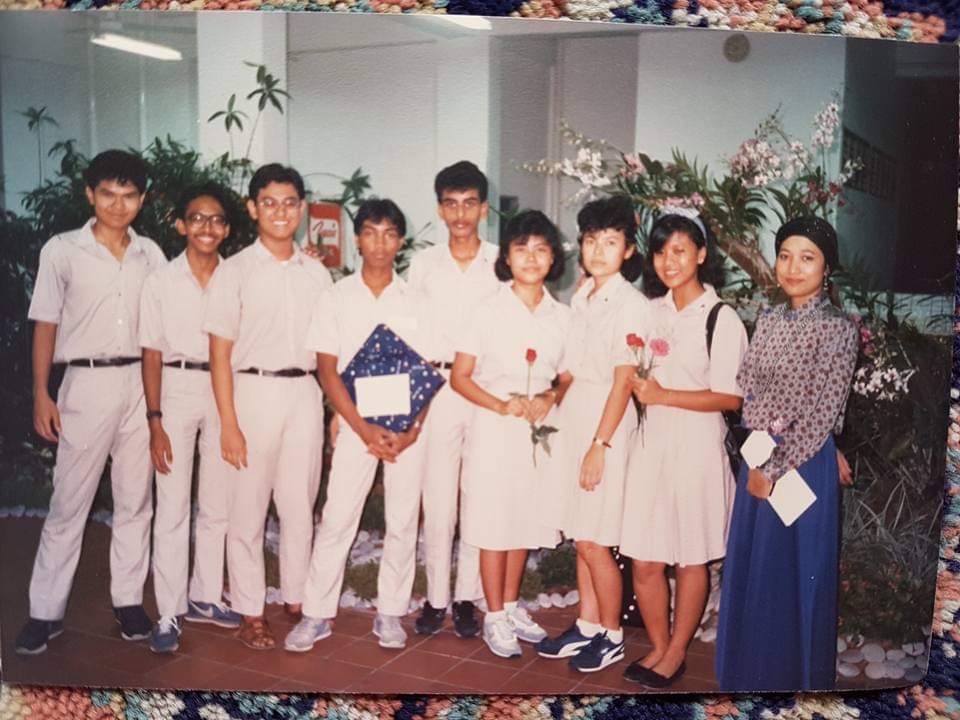 Sa'eda pictured with her students during her time as a teacher at Jurong Junior College, (1990)